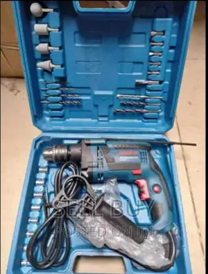 Photo - Bosh Drill With Accessories