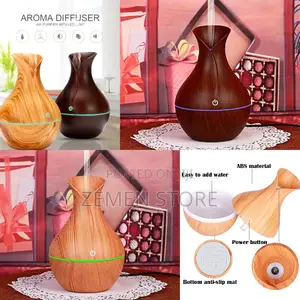Photo - መልካም መዓዛ የሚያውድ Mini Aroma Humidifier Aromatherapy Diffuser