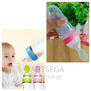 Photo - Silcone Bottle Spoon Feeder