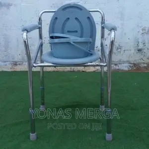 Photo - Medokare Bedside Commode Chair-Heavy-Duty Raised Toilet Seat