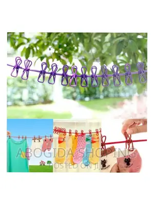 Photo - Elastic Laundry Rope With 12 Clothespins