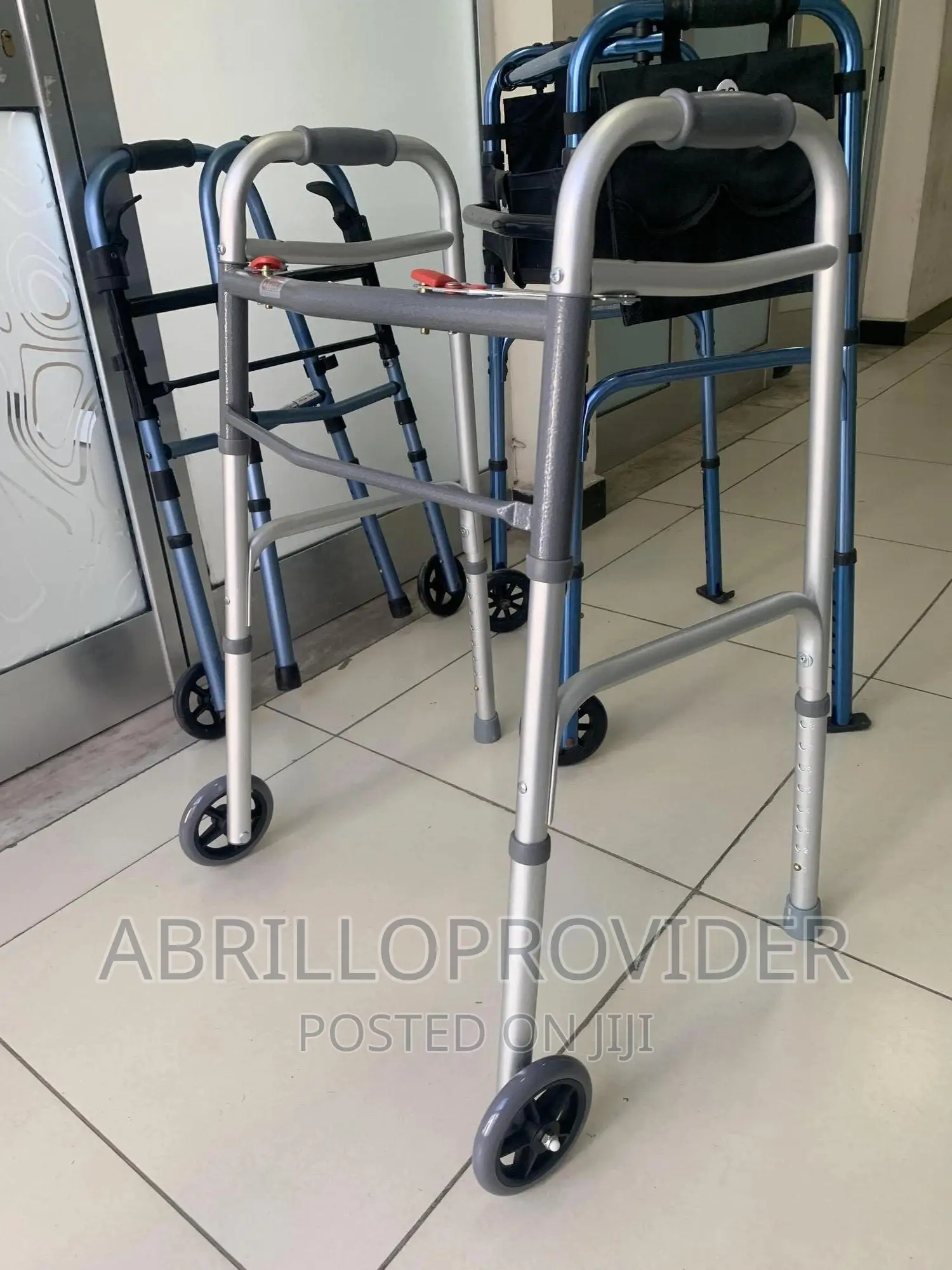 Walker With Wheels - Dual Button Folding Walker.Walker_walk