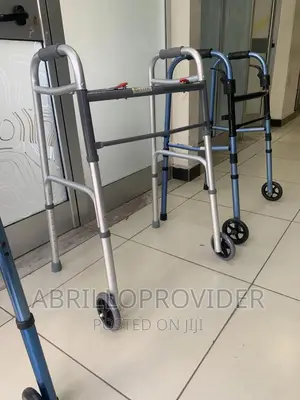 Walker W|Wheels - Dual Button Folding Walker.Walker|Walker