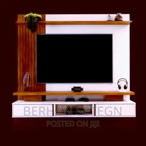 Photo - Habesha Tv Stands ግድጎዳ ላይ የሚለጠፉ ቲቪ ስታንዶች