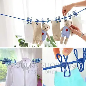 Photo - Portable Drying Rack Clips Cloth Hanger