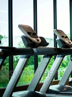 Photo - ዘመናዊ የመሮጫ ማሽን እና የስፖርት ሳይክል Treadmill Call Us Now