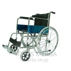 An Adult, Folding, Wheelchair Surbhi Imported Wheelchair