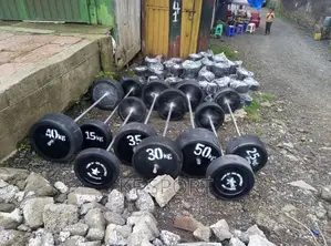Photo - ዳምፔልና ባርቤል ( Dumbbell and Barbell)