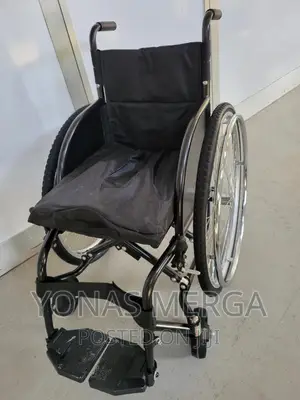 Photo - Wheelchair/Puncture Collision Carrying Wheelchair Portable