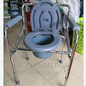 Photo - Drop Arm Commode_ Made Out of Durable,Lightweight Aluminium