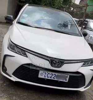 Photo - Toyota Corolla 2023 White