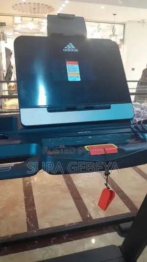 Photo - Treadmills Call Us Now ዘመናዊ የመሮጫ ማሽን