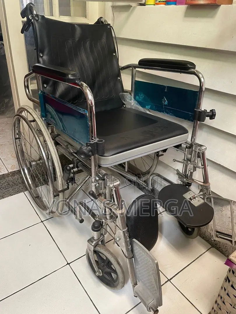 Wheelchair Pushed Into Sleeping Position Commode Facility
