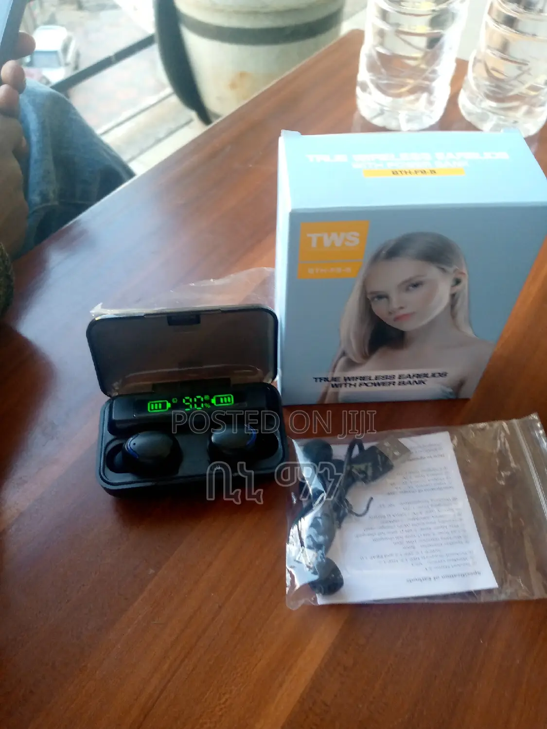 True Wireless Earbuds Connect Each Other With Out Any Wires.