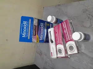 Photo - Kirkland Minoxidil With Derma Roller