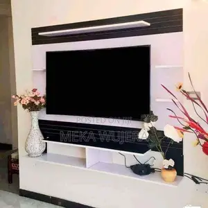 Photo - የቤቶ ውበት Tv Stand
