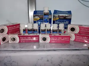 Photo - Kirkland Minoxidil With Derma Roller