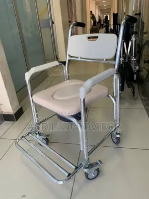 Photo - Shower Chair/ Bedside Commode / Casters and Padded Seat,