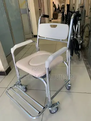 Photo - Zimtown Shower Chair/ Bedside Commode Casters Padded Seat