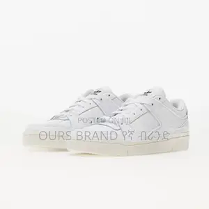 Photo - Adidas Forum Exhibit" Triple White Low Cut High