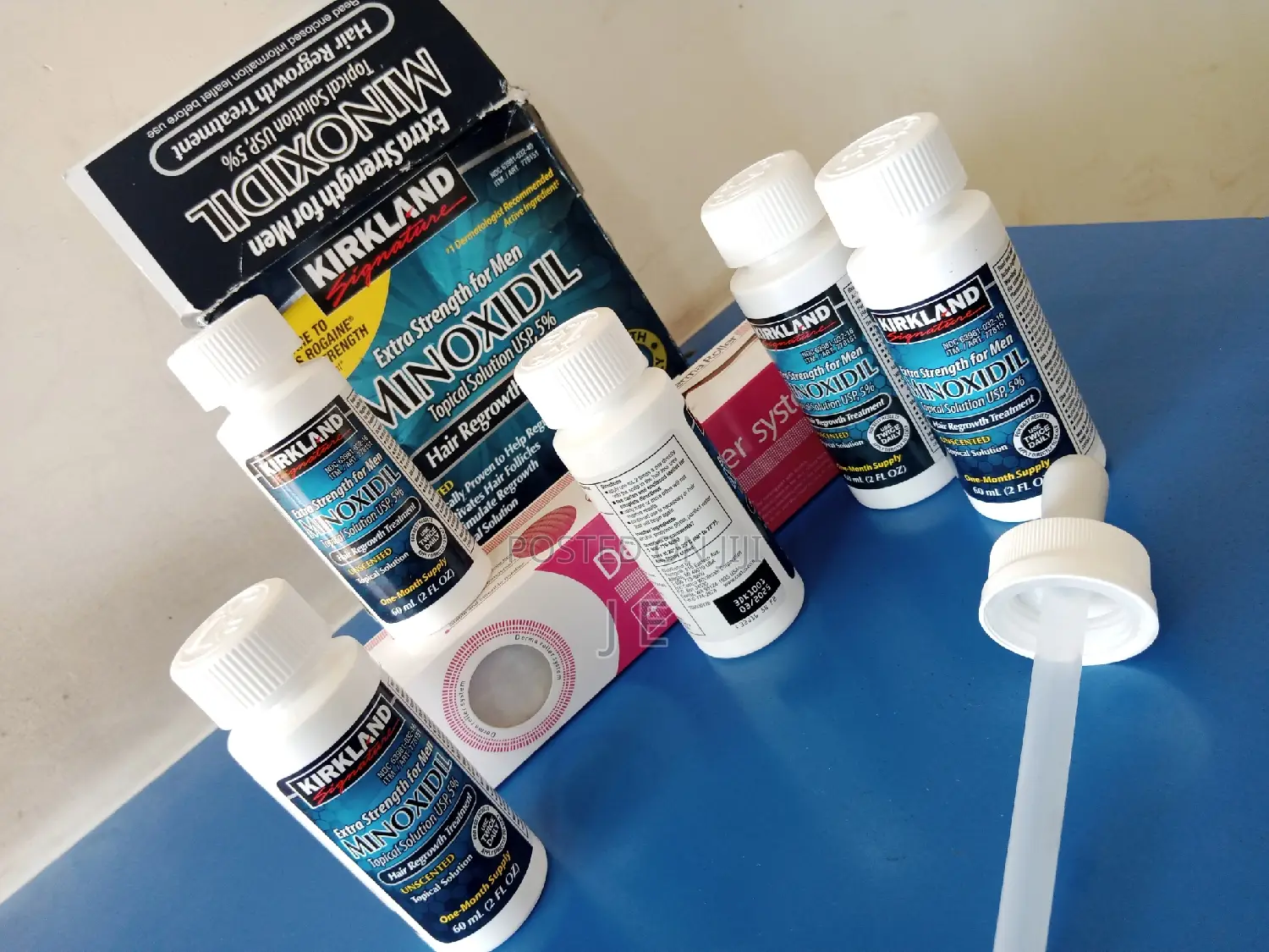 Kirkland Minoxidil With Different Size Derma