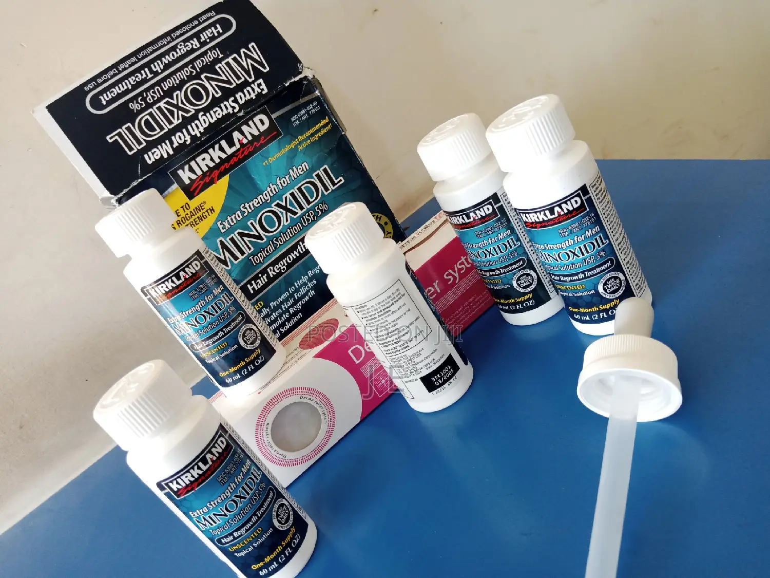Kirkland Minoxidil With Different Size Derma