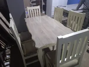 የገበታ ጠረጴዛ ከ 6 ወንበር ጋር በዋንዛ የተሰራ