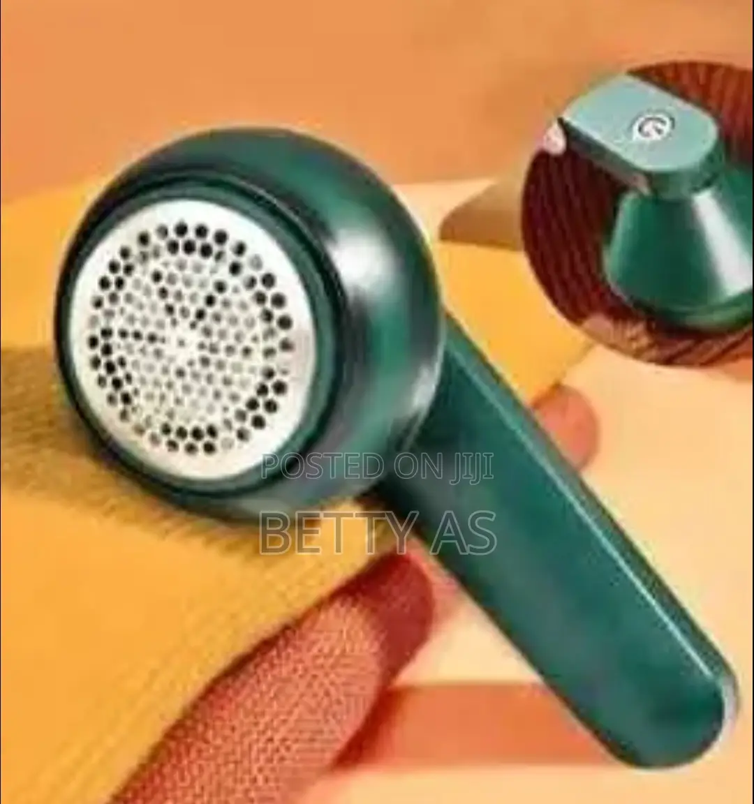 Lint Remover (የተነጫጩ ልብሶችን )
