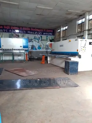 Photo - ላሜራ ማጠፍያ እና መቁረጫ