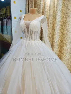 Photo - የሚሸጥ የሙሽራ ቀሚስ ቬሎ ዘመናዊ እና ቆንጆ