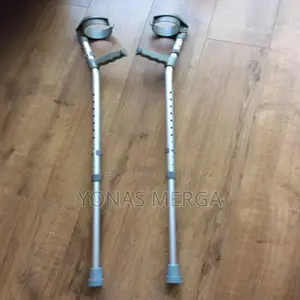 Photo - ክራንች亞adjustable Elbow Crutches -Plastic Handles Extra Long
