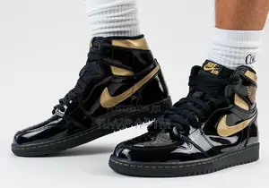 Photo - Original Air Jordan 1 High OG “Metallic Gold” Shoes