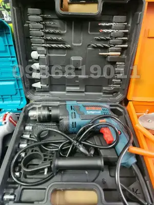 Photo - Impact Drill Bosch Drill With Accessories