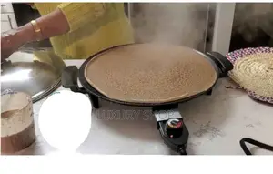 Enat Metad እናት ምጣድ