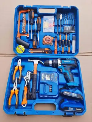 Photo - Chargeable Drill With Accessories