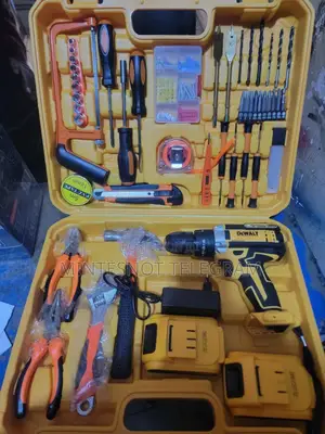 Photo - Dewalt Chargeable Drill With Accessories