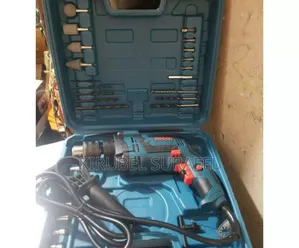 Photo - Drill With Accesories
