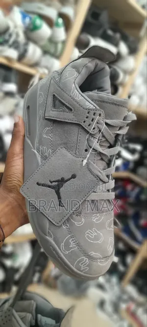 Photo - KAWS Air Jordan 4 Master Quality