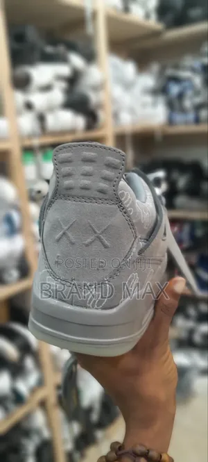 Photo - KAWS Air Jordan 4 Master Quality