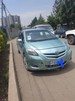 Photo - Toyota Belta 2007 Ivory