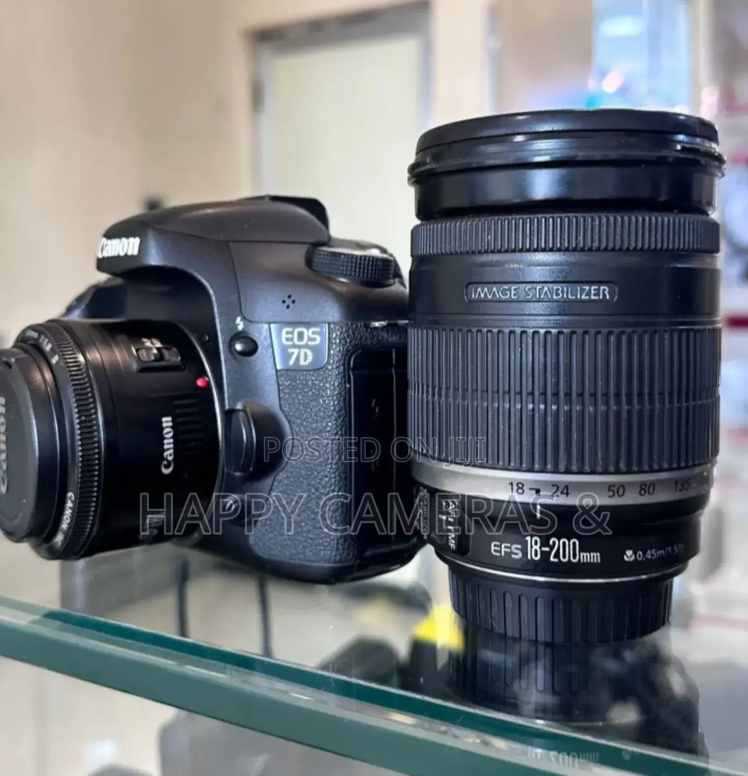 Canon 7D + 18-200mm + 50mm