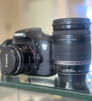 Canon 7D + 18-200mm + 50mm