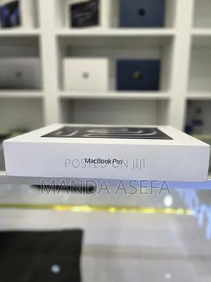 Photo - New Laptop Apple MacBook Pro 18GB Apple M3 SSD 512GB