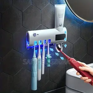 Photo - Toothbrush UV Sterilizer and Dispenser'