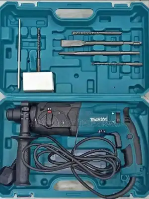 Photo - Makita Hammer Drill With Box