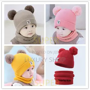 Photo - ከፍተኛ ጥራት ያለው.የህፃን ልጅ ( ኮፍያ እና ስካርቭ)