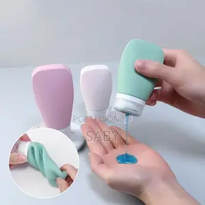 Photo - 4pce Portable Squeezable Bottle