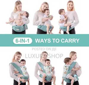 Photo - ባለመቀመጫዉ ማዘያ Baby Carrier