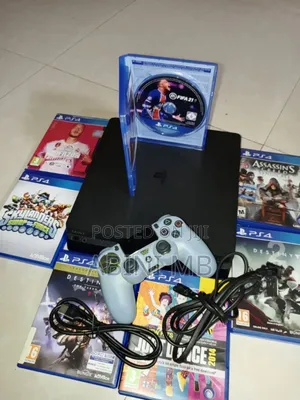 Photo - Playstation 4 Slim With 8 Cd