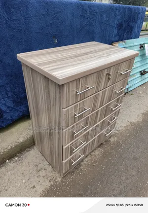 Photo - ሸሚዝ ማስቀመጫ/ ኮሞ